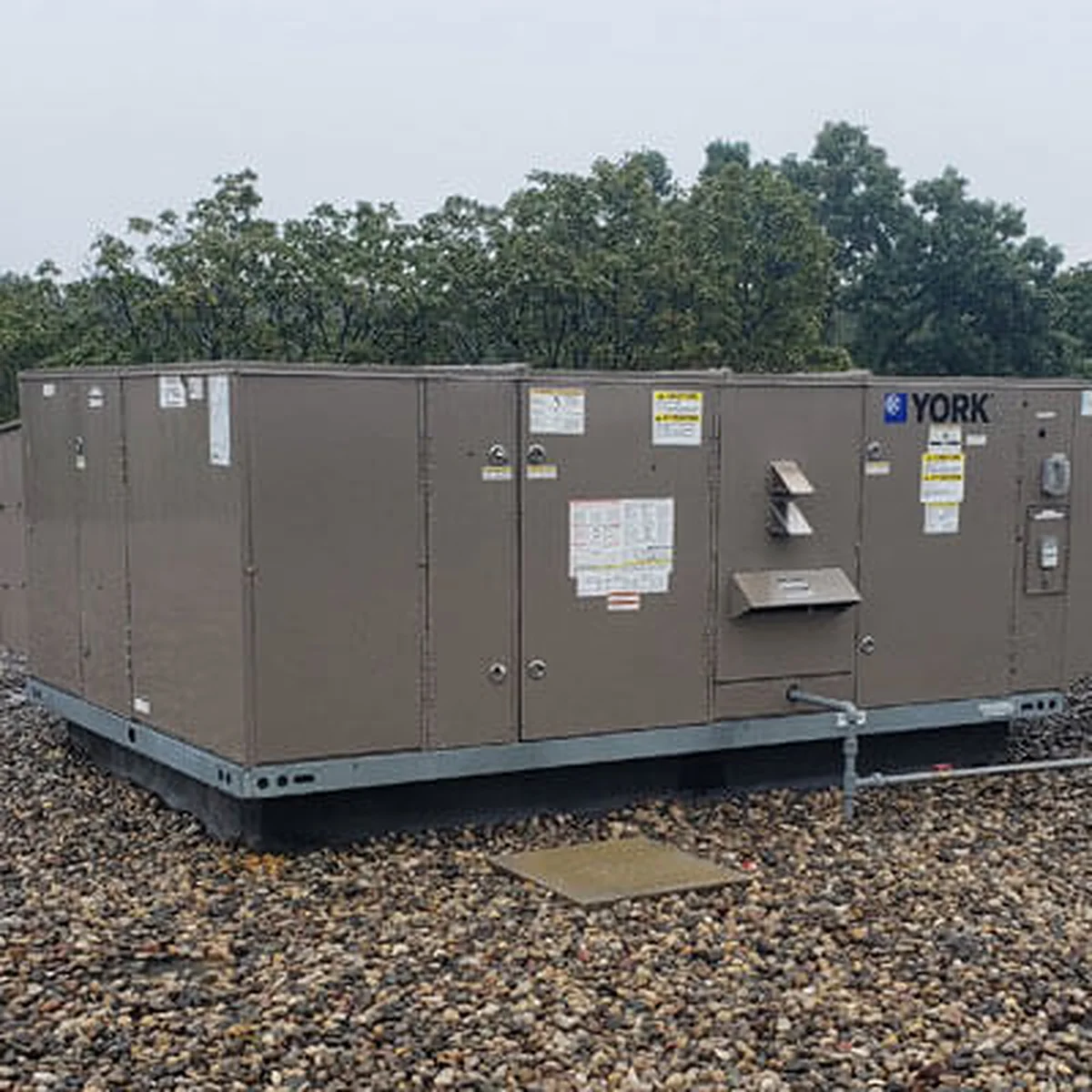 Commercial rooftop HVAC equipment on a client building