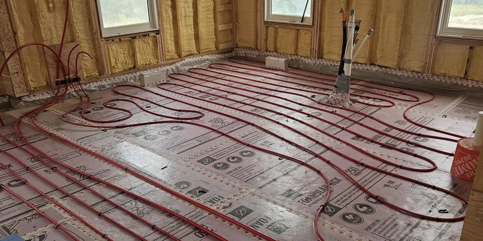 Radiant floor heating tubing installed in a new Michigan home under construction